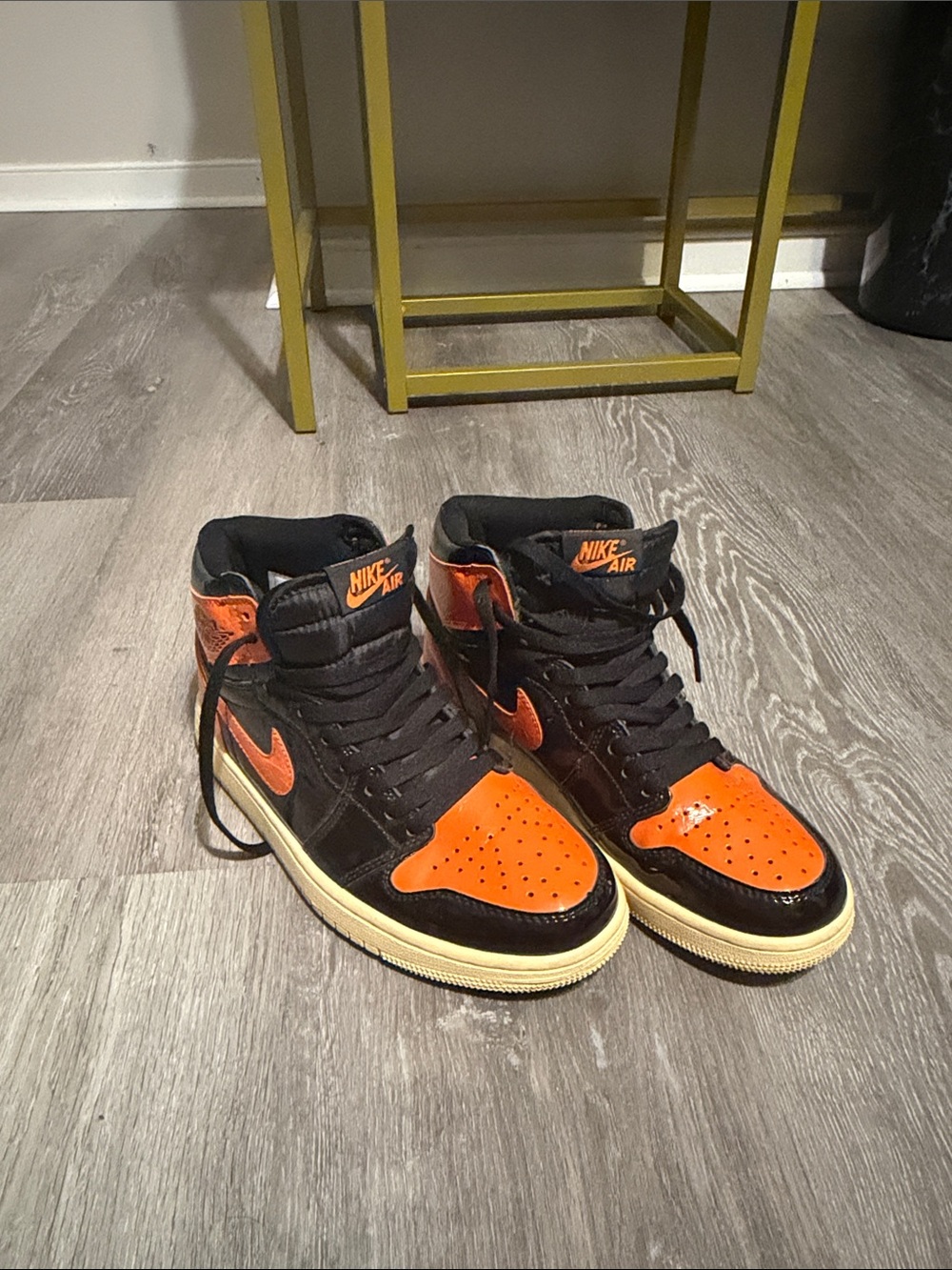Women’s Jordan Retro High-Top Sneakers in Black & Orange